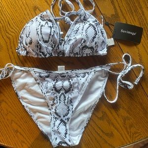 Super cute bikini, and cover up or dress.